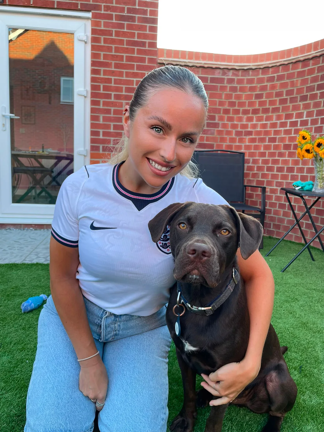 Ella with a dog
